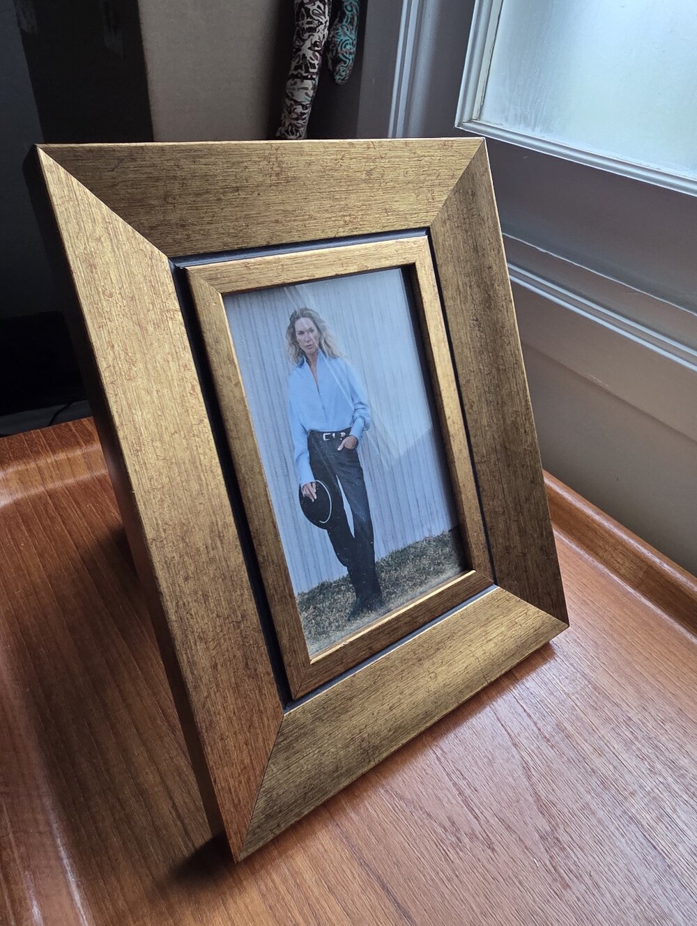 Lovely Golden picture frame, brushed gold-colored finish and a dark pin Stripe